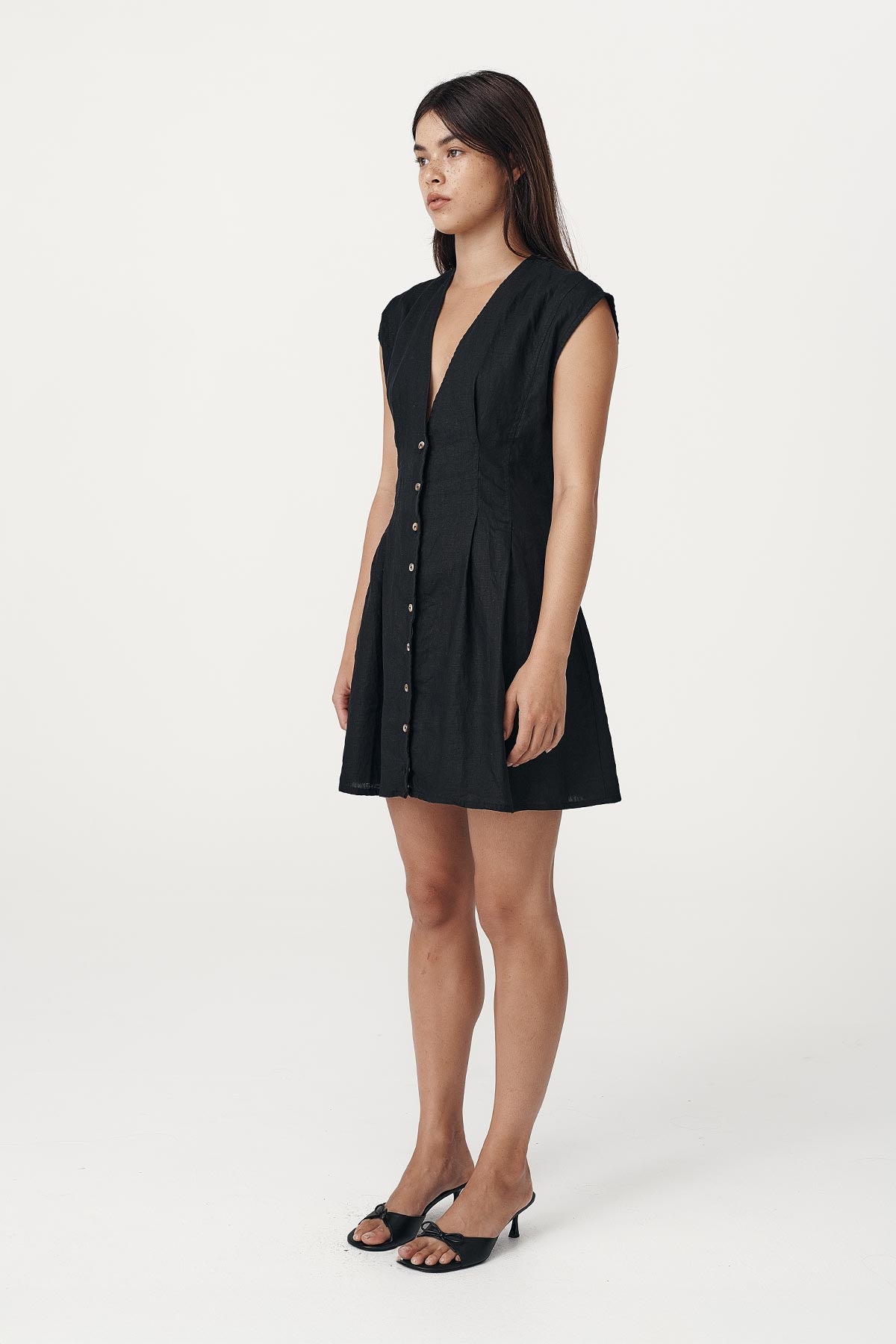 Rowie the label Mira dress in noir studio shot side on