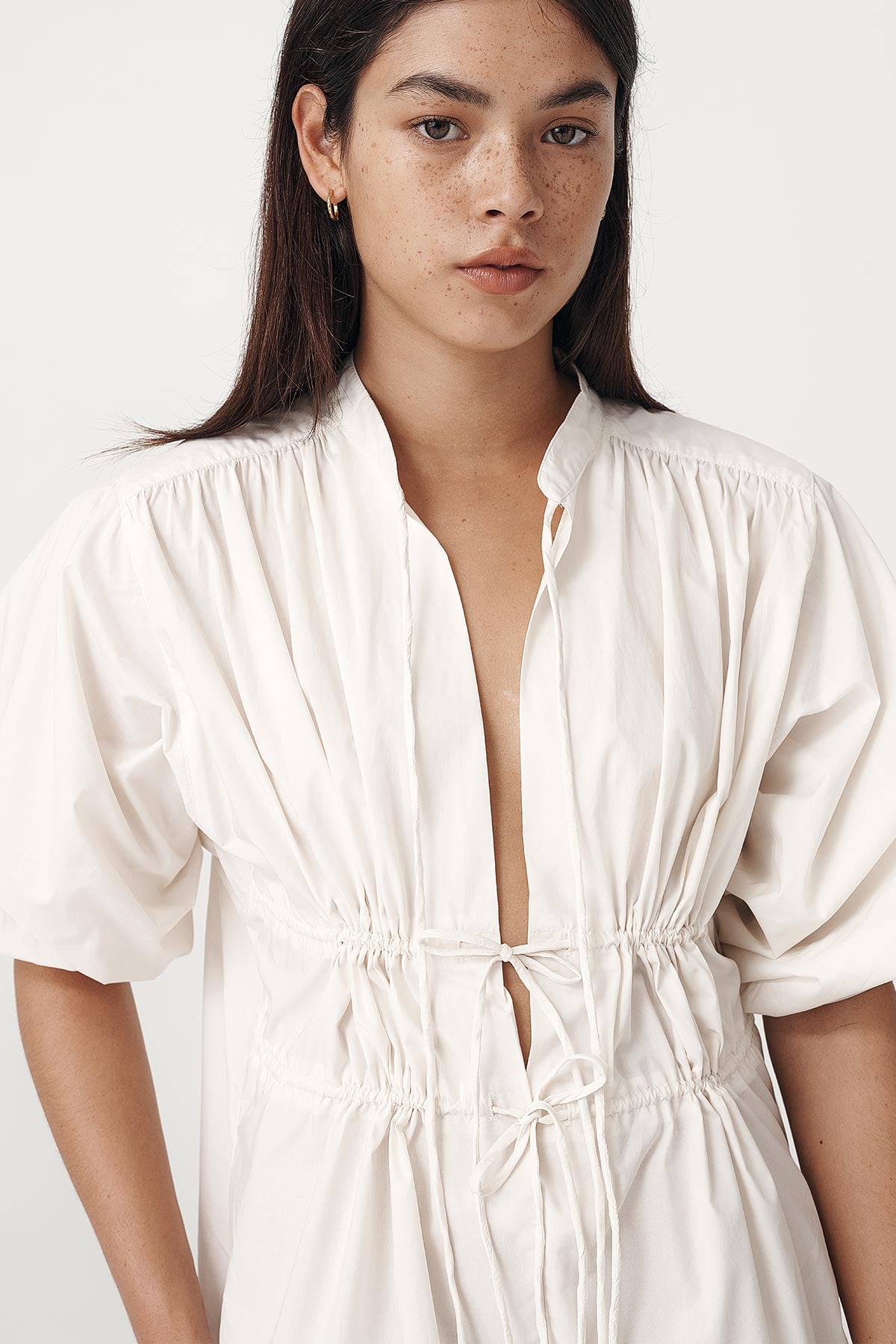 Rowie the label piper organic mini dress in creme studio shot 1