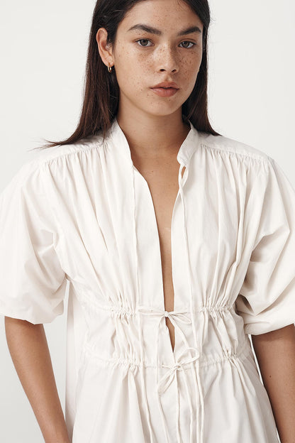 Rowie the label piper organic mini dress in creme studio shot 1