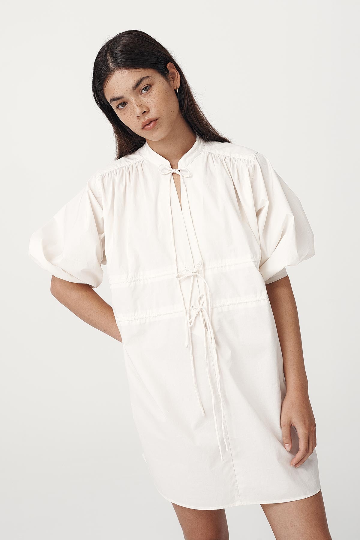 Rowie the label piper organic mini dress in creme studio shot 2