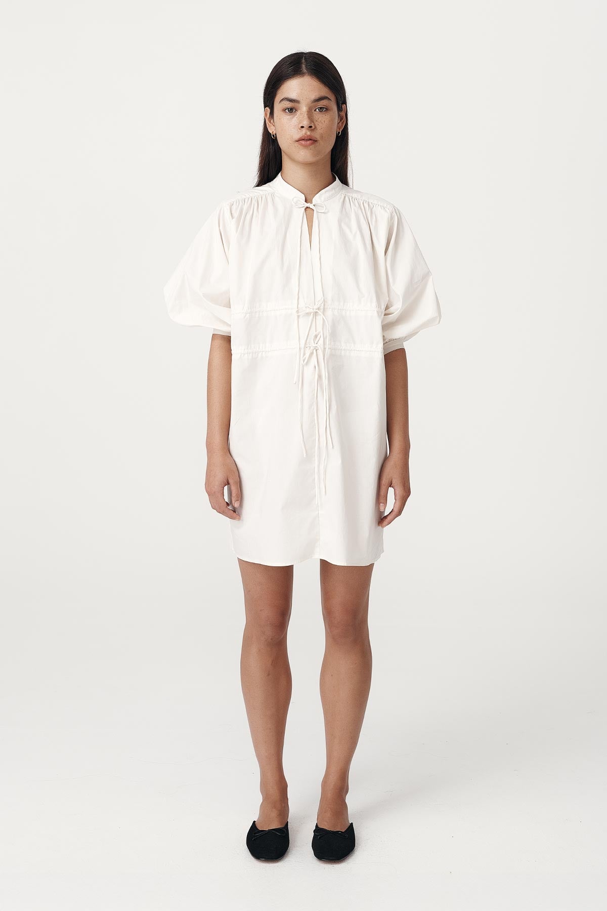Rowie the label piper organic mini dress in creme studio shot 5