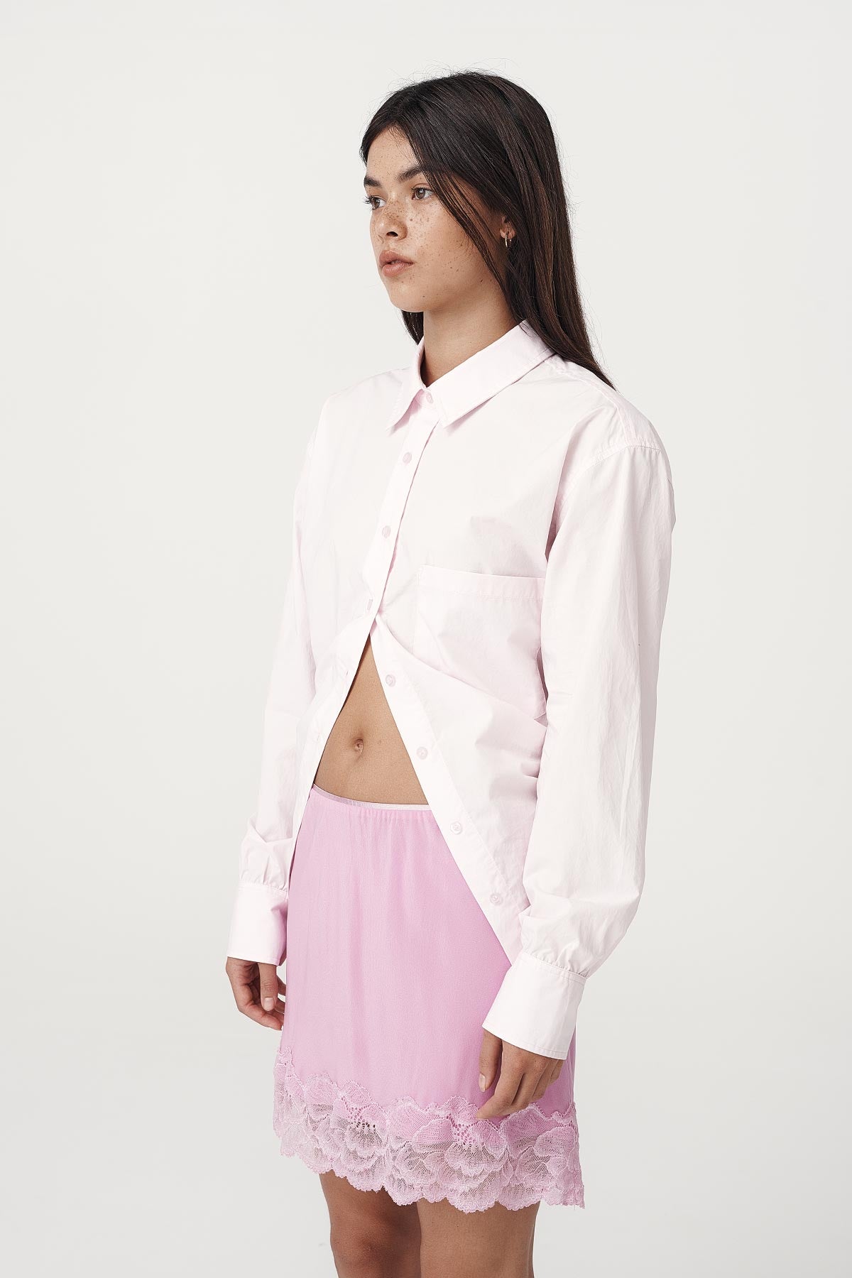 Rowie the label Ramona tie back shirt in powder pink studio shot side on
